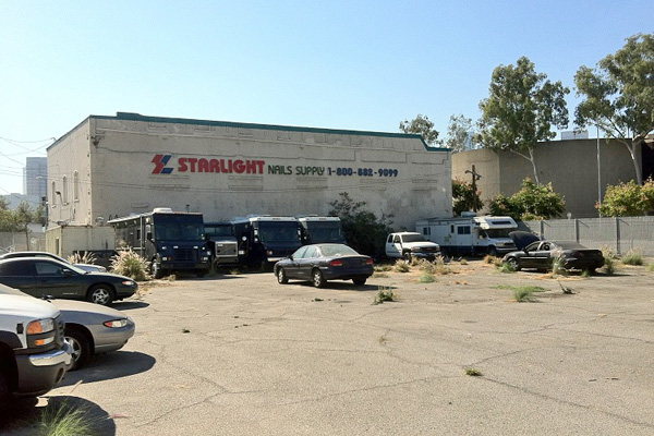 Parking lot of trashed city vehicles