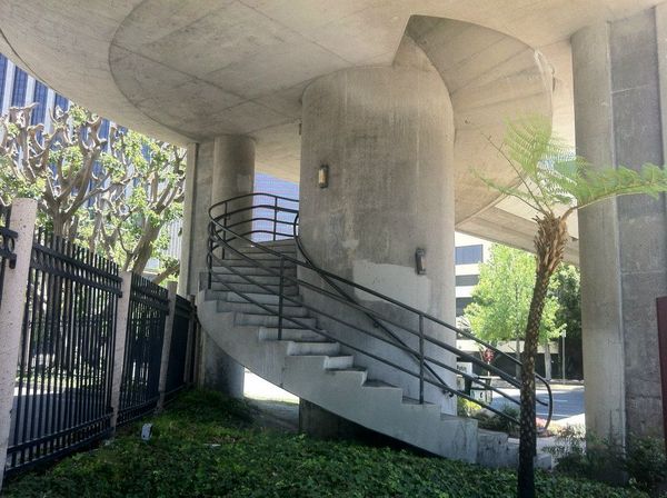 A spiral staircase connecting the workers' level to the plebians below